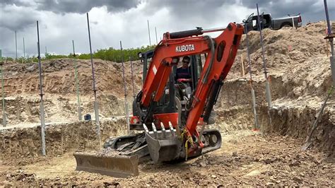 how to put the track back on a mini excavator|track back for mini excavators.